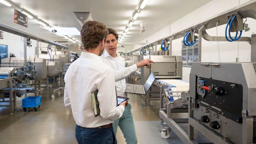 Consultants inside the factory